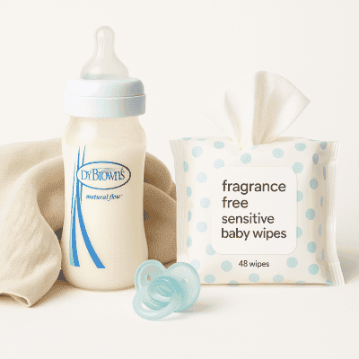 Bottle of baby formula, box of fragrance-free sensitive baby wipes, baby pacifier, infant feeding essentials, Stamford delivery service for baby care products, BabyDashNow™.