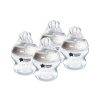 Glass baby bottles with silicone nipples, branded "Tommee Tippee," designed for infants' feeding needs. Perfect for infant nutrition, featuring easy-to-clean and BPA-free materials.